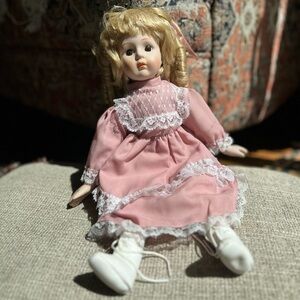 The Heritage Signature Collection Pink Porcelain Doll with Lace Dress